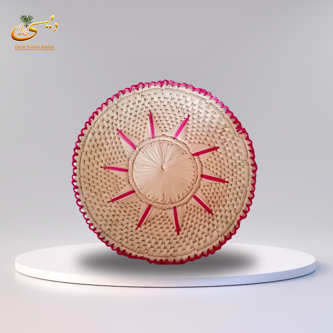 Handwoven Palm Leaf Wall Plate – Sunburst Design with Pink Accents